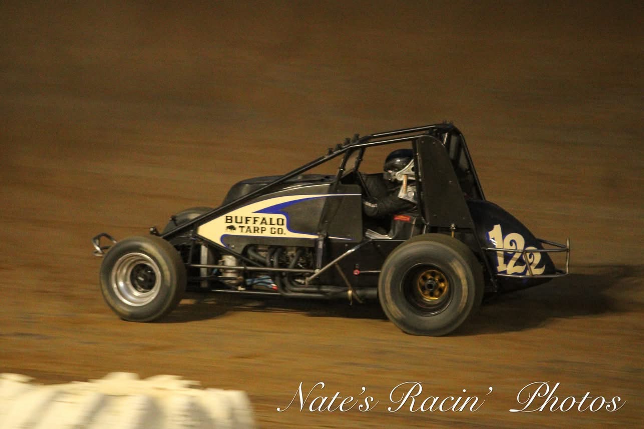 Buffalo Tarp Co. sprint car #12 on the dirt.
